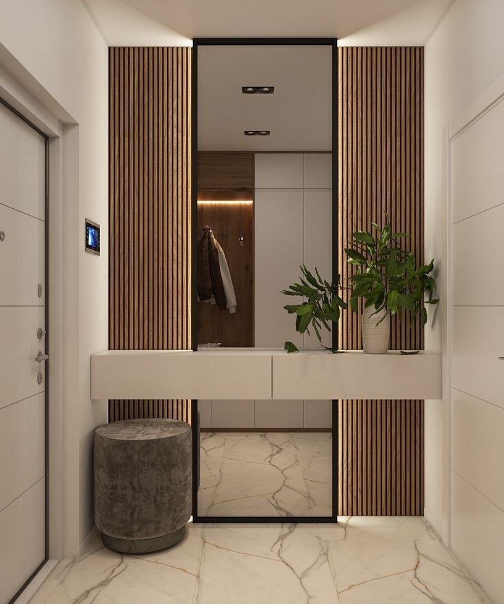 خدمة مرايا بطابع عصري وخطوط دقيقة ضمن قسم ديكور مداخل واستقبال