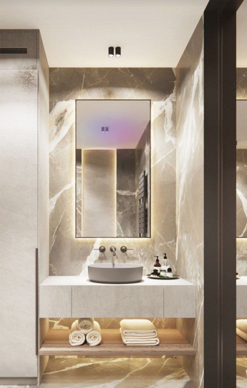 خدمة رخام ولمسات ذهبية ضمن قسم مغاسل